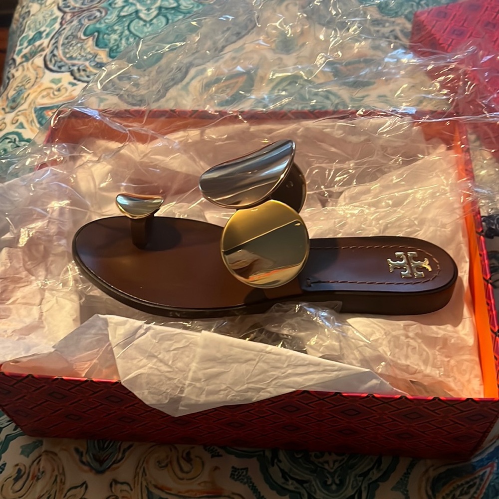 These are Tory Burch stylish sandals size 6 womens. Brand new and comes with box